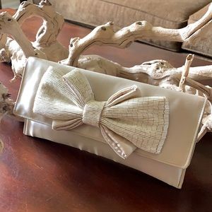 Le Regale cream satin bag NWT w/beaded bow